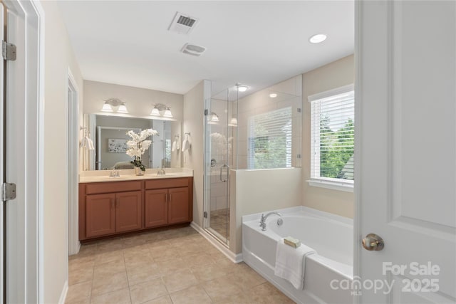 10806 Cove Point Dr, Charlotte, NC 28278 - full bath with double vanity, a bath, a stall shower, and tile patterned floors