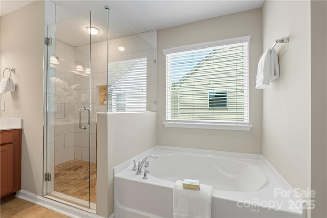 10806 Cove Point Dr, Charlotte, NC 28278 - full bath featuring a bath, plenty of natural light, vanity, and a shower stall