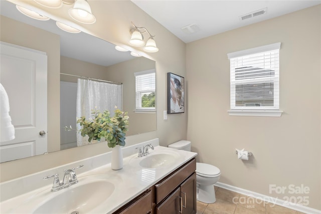 10806 Cove Point Dr, Charlotte, NC 28278 - bathroom with double vanity, tile patterned floors, and a shower with shower curtain