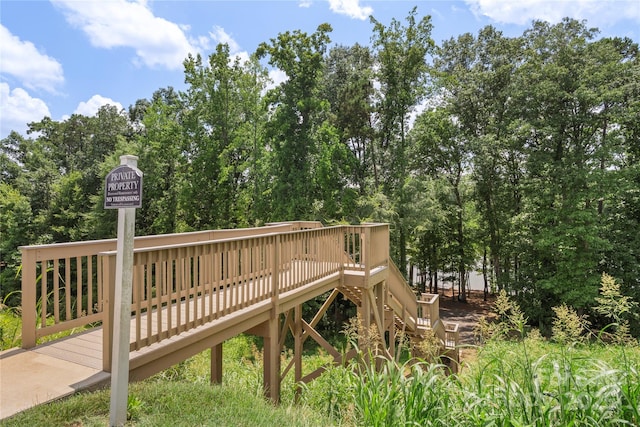 10806 Cove Point Dr, Charlotte, NC 28278 - view of property's community featuring a wooden deck and view of wooded area