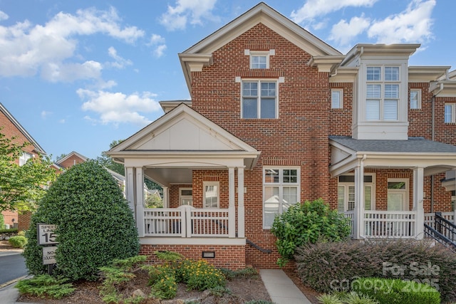 4937 S Hill View Dr, Charlotte, NC 28210 - view of front of house featuring a porch and brick siding