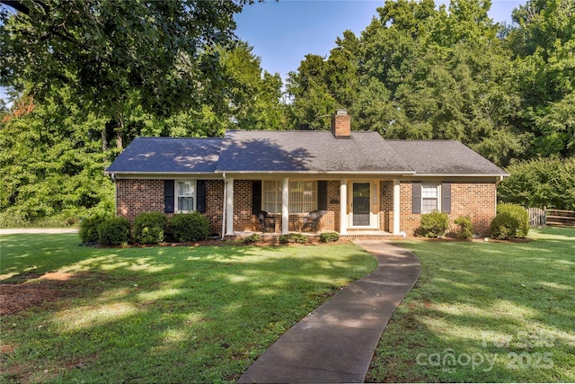 1828 Independence Sq, Kannapolis, NC 28081 - ranch-style house with covered porch, brick siding, a chimney, and roof with shingles