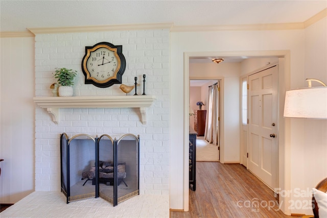 1828 Independence Sq, Kannapolis, NC 28081 - detailed view of ornamental molding, wood finished floors, and a brick fireplace