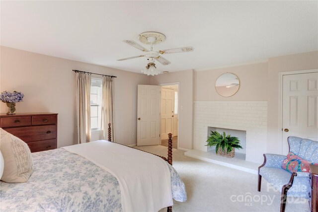 1828 Independence Sq, Kannapolis, NC 28081 - carpeted bedroom featuring ceiling fan and a fireplace