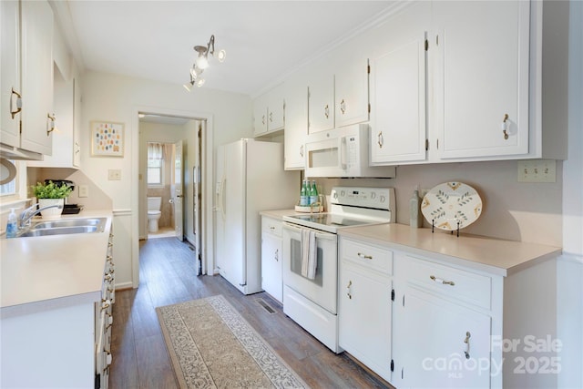 1828 Independence Sq, Kannapolis, NC 28081 - kitchen with white appliances, white cabinets, light countertops, and wood finished floors