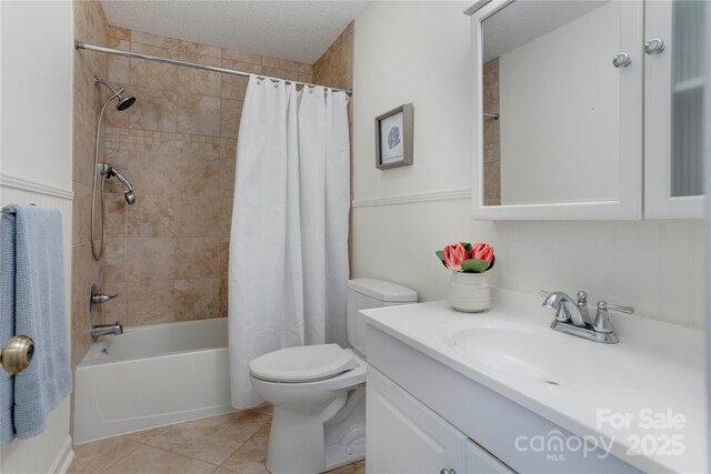 1828 Independence Sq, Kannapolis, NC 28081 - bathroom featuring vanity, shower / bathtub combination with curtain, tile patterned floors, and a textured ceiling