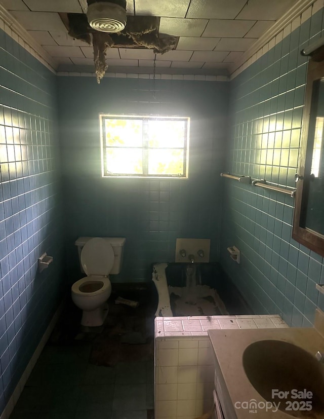 2870 Rutherford College Rd, Connelly Springs, NC 28612 - bathroom with tile walls, vanity, and tile patterned floors