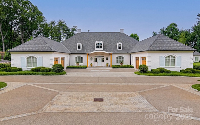 2632 Bartram Pl, Winston Salem, NC 27106 - french provincial home featuring a chimney and a high end roof