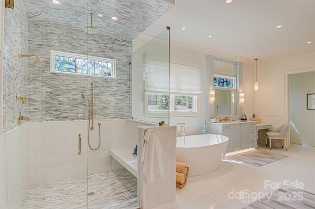 2632 Bartram Pl, Winston Salem, NC 27106 - full bathroom with vanity, a stall shower, a soaking tub, tile patterned floors, and recessed lighting