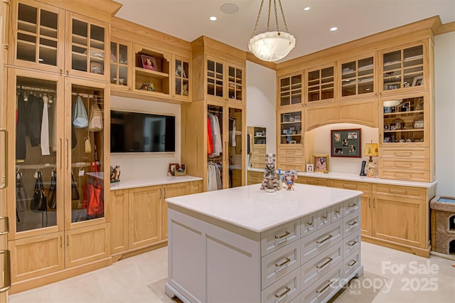 2632 Bartram Pl, Winston Salem, NC 27106 - kitchen featuring light countertops, recessed lighting, glass insert cabinets, a center island, and hanging light fixtures