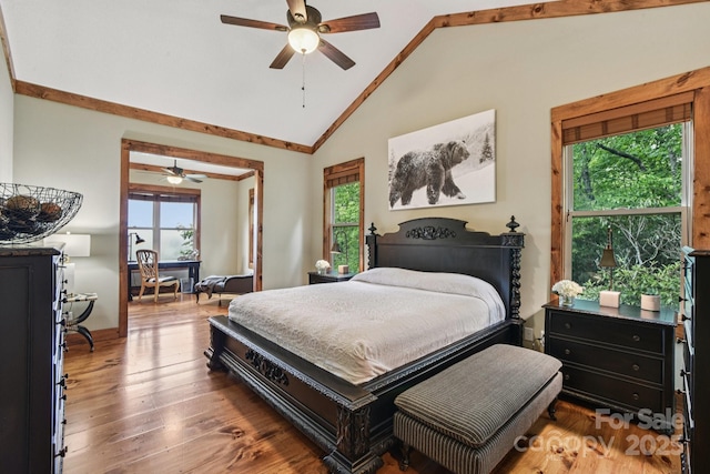 71 Raptor Way, Sapphire, NC 28774 - bedroom featuring lofted ceiling, multiple windows, wood finished floors, and a ceiling fan