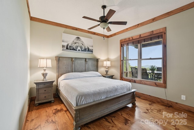 71 Raptor Way, Sapphire, NC 28774 - bedroom with wood finished floors and a ceiling fan