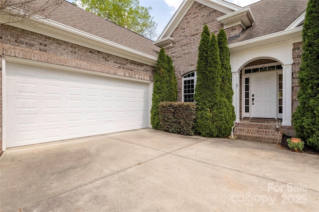 233 Highland Forest Dr, Clover, SC 29710 - property entrance with brick siding, driveway, and a shingled roof