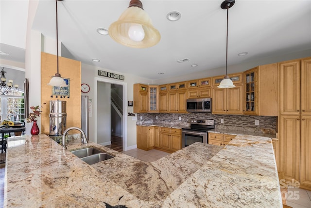 233 Highland Forest Dr, Clover, SC 29710 - kitchen with stainless steel appliances, light tile patterned floors, decorative backsplash, light stone countertops, and glass insert cabinets