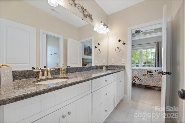 233 Highland Forest Dr, Clover, SC 29710 - ensuite bathroom featuring double vanity, tile patterned floors, and a ceiling fan