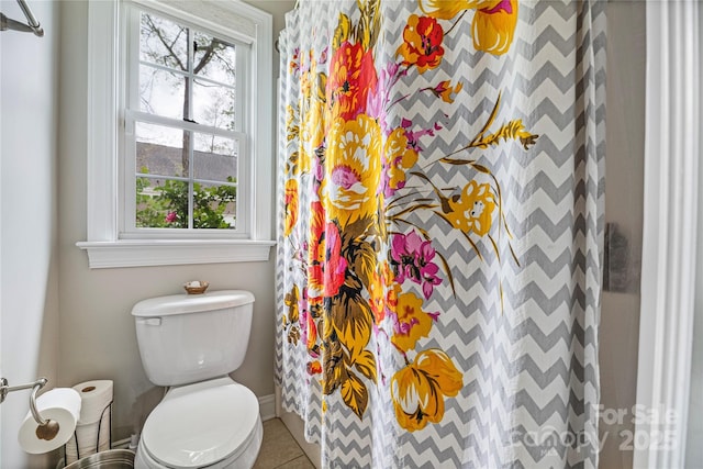 233 Highland Forest Dr, Clover, SC 29710 - bathroom with healthy amount of natural light, a shower with shower curtain, and tile patterned floors