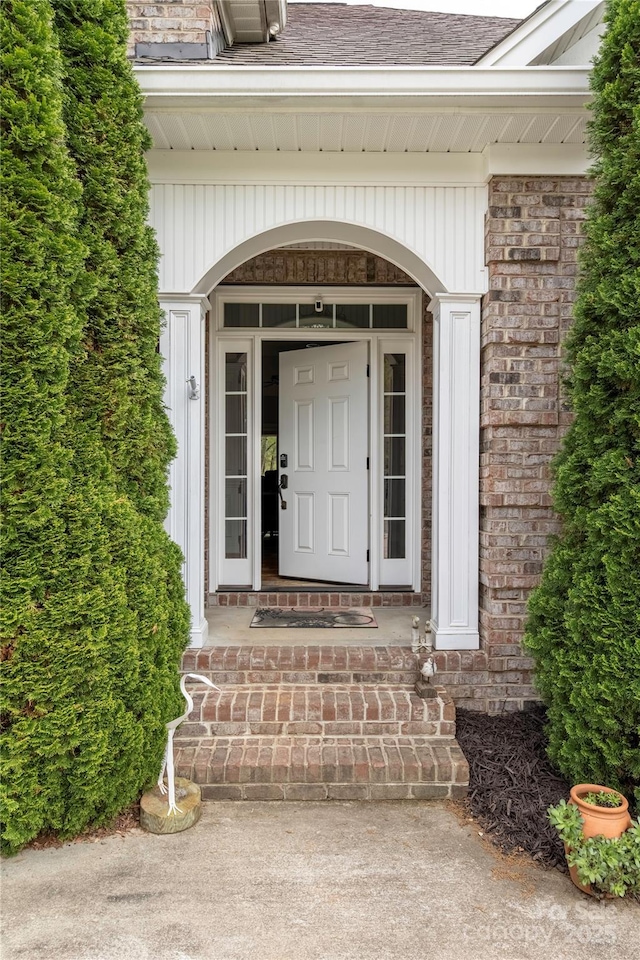 233 Highland Forest Dr, Clover, SC 29710 - view of exterior entry featuring roof with shingles and brick siding