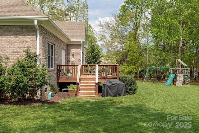 233 Highland Forest Dr, Clover, SC 29710 - view of grassy yard with a wooden deck and a playground