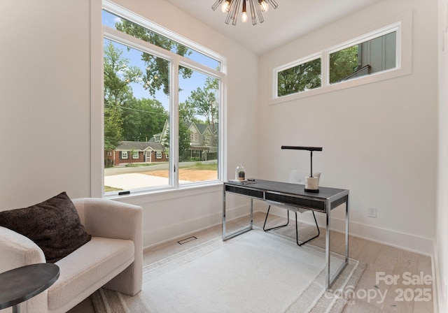 1727 Seifert Cir, Charlotte, NC 28205 - office space featuring healthy amount of natural light and wood finished floors
