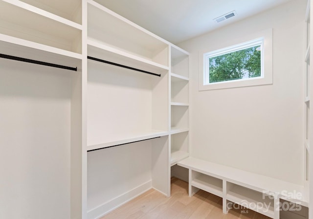 1727 Seifert Cir, Charlotte, NC 28205 - spacious closet with light wood-style floors