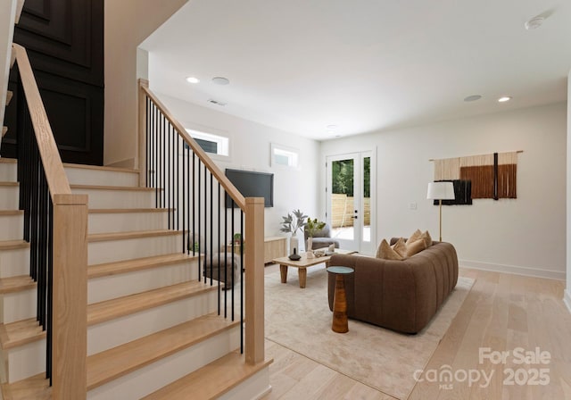 1727 Seifert Cir, Charlotte, NC 28205 - stairway with wood finished floors, french doors, and recessed lighting