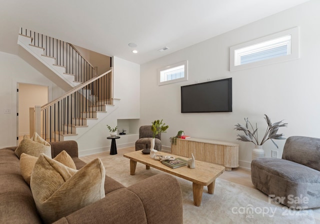 1727 Seifert Cir, Charlotte, NC 28205 - living room featuring stairs and recessed lighting