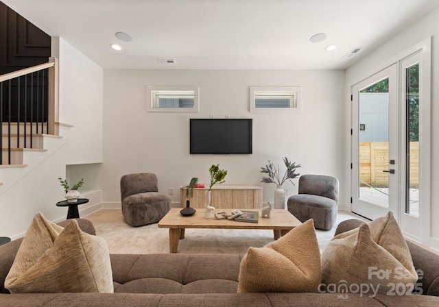1727 Seifert Cir, Charlotte, NC 28205 - carpeted living room with recessed lighting and stairway
