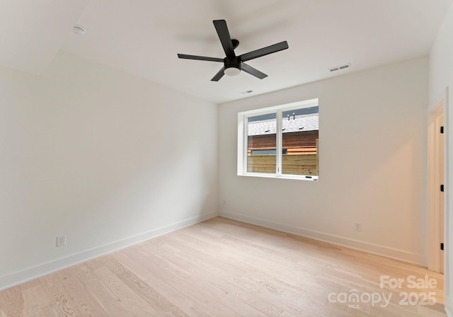 1727 Seifert Cir, Charlotte, NC 28205 - unfurnished room with light wood-style floors and a ceiling fan