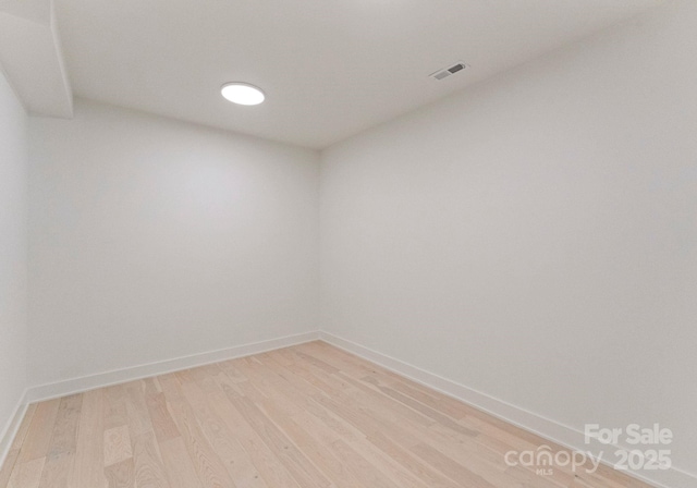1727 Seifert Cir, Charlotte, NC 28205 - spare room with light wood-style floors and baseboards