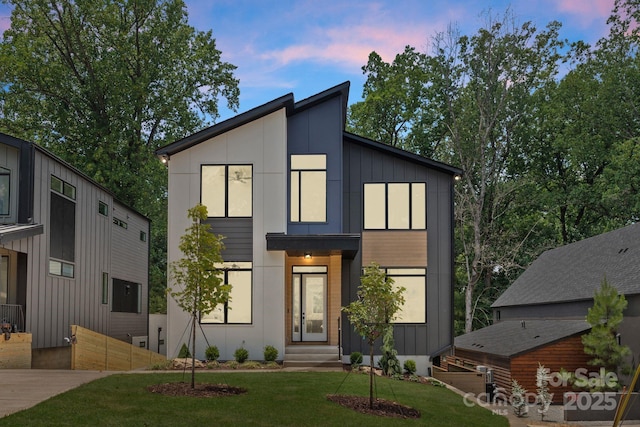 1727 Seifert Cir, Charlotte, NC 28205 - contemporary house featuring board and batten siding and a lawn