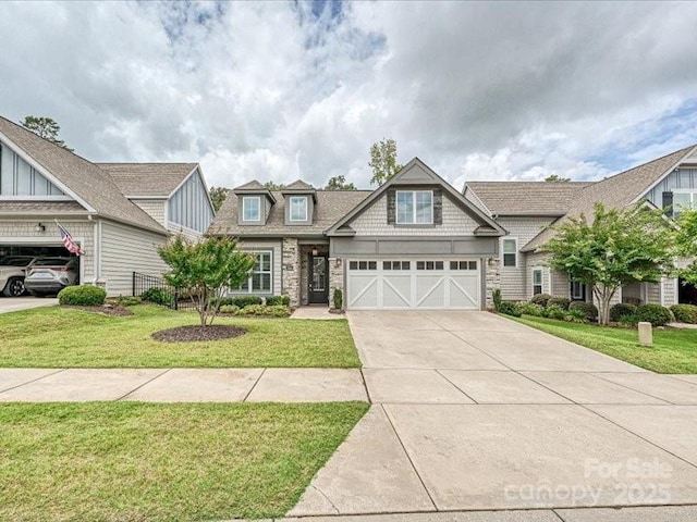 2034 Laney Pond Rd, Matthews, NC 28104 - craftsman house with concrete driveway, a garage, a front lawn, and stone siding