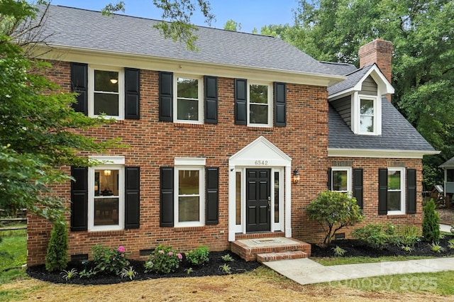 6542 Cross Field Ln, Charlotte, NC 28226 - colonial-style house featuring brick siding, a shingled roof, a chimney, and crawl space