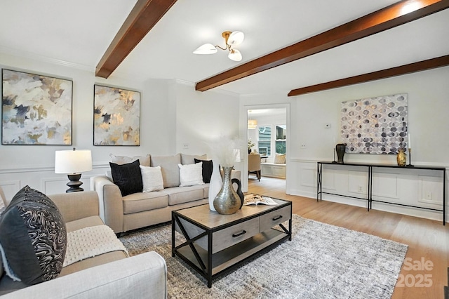 6542 Cross Field Ln, Charlotte, NC 28226 - living area with beam ceiling, wood finished floors, and crown molding