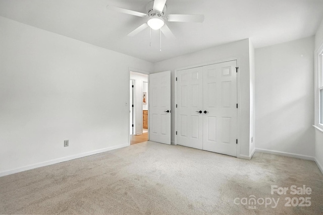 6542 Cross Field Ln, Charlotte, NC 28226 - unfurnished bedroom featuring carpet floors, a closet, and a ceiling fan