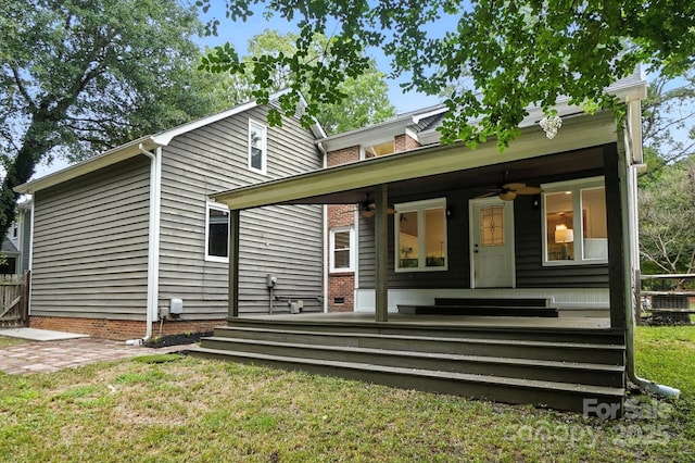 6542 Cross Field Ln, Charlotte, NC 28226 - back of house featuring a ceiling fan and a deck