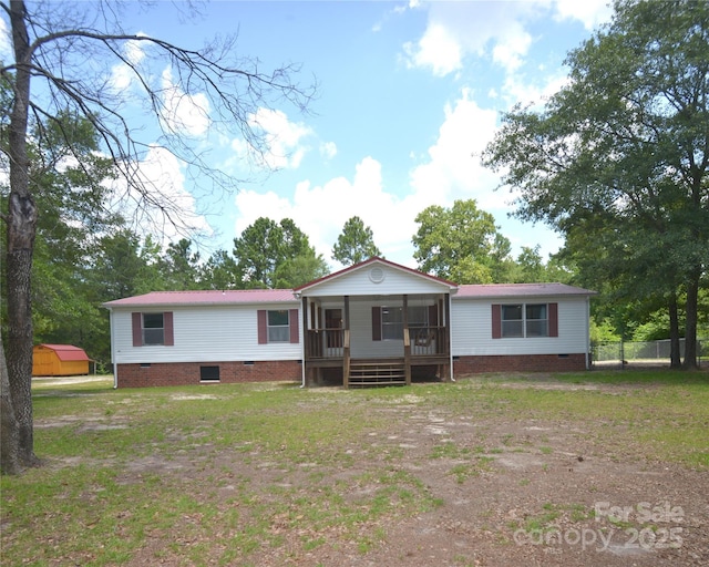 8221 Feather Run Rd, Kershaw, SC 29067 - view of front of house featuring crawl space and a sunroom