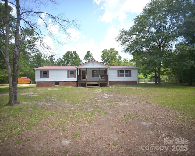 8221 Feather Run Rd, Kershaw, SC 29067 - manufactured / mobile home featuring crawl space and a sunroom