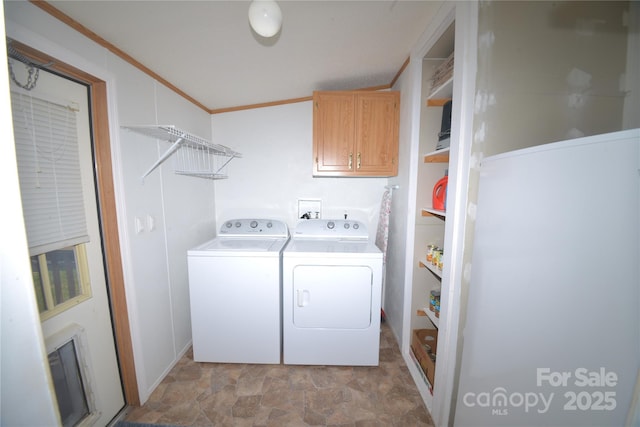 8221 Feather Run Rd, Kershaw, SC 29067 - washroom featuring separate washer and dryer, cabinet space, and stone finish flooring