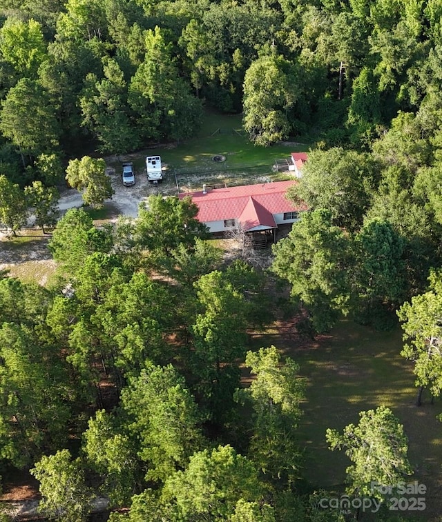 8221 Feather Run Rd, Kershaw, SC 29067 - aerial view of property and surrounding area with a heavily wooded area