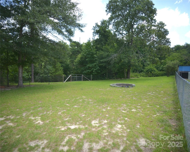 8221 Feather Run Rd, Kershaw, SC 29067 - view of yard featuring a fire pit
