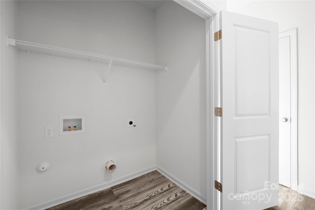 167 Dry Dock Loop, Mooresville, NC 28117 - laundry area featuring gas dryer hookup, wood finished floors, hookup for an electric dryer, and washer hookup
