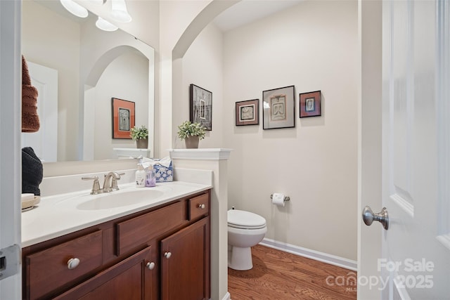 16833 Rudence Ct, Charlotte, NC 28278 - half bathroom with vanity and wood finished floors