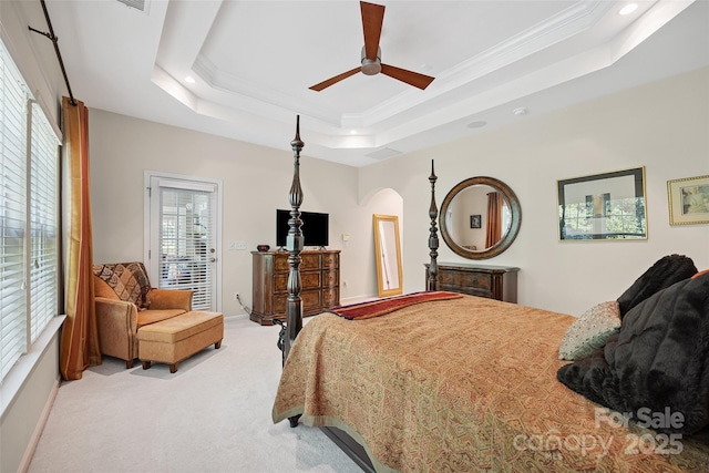 16833 Rudence Ct, Charlotte, NC 28278 - bedroom with light colored carpet, a tray ceiling, recessed lighting, arched walkways, and crown molding