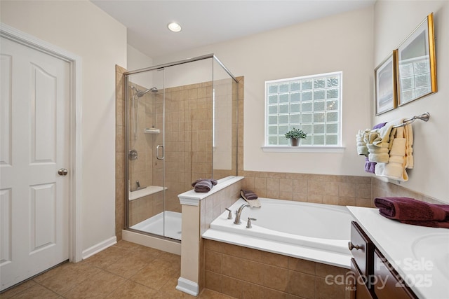 16833 Rudence Ct, Charlotte, NC 28278 - bathroom with a bath, a shower stall, tile patterned flooring, and vanity
