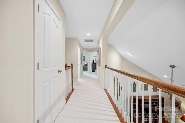 16833 Rudence Ct, Charlotte, NC 28278 - hallway with an upstairs landing, recessed lighting, and light carpet