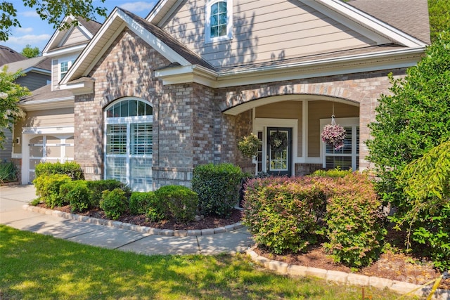 16833 Rudence Ct, Charlotte, NC 28278 - property entrance with a garage and brick siding