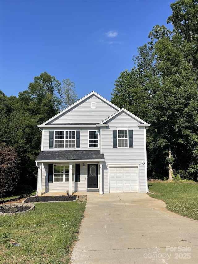 961 Poplar Forest Rdg, Clover, SC 29710 - traditional-style home featuring concrete driveway, an attached garage, covered porch, and a front lawn