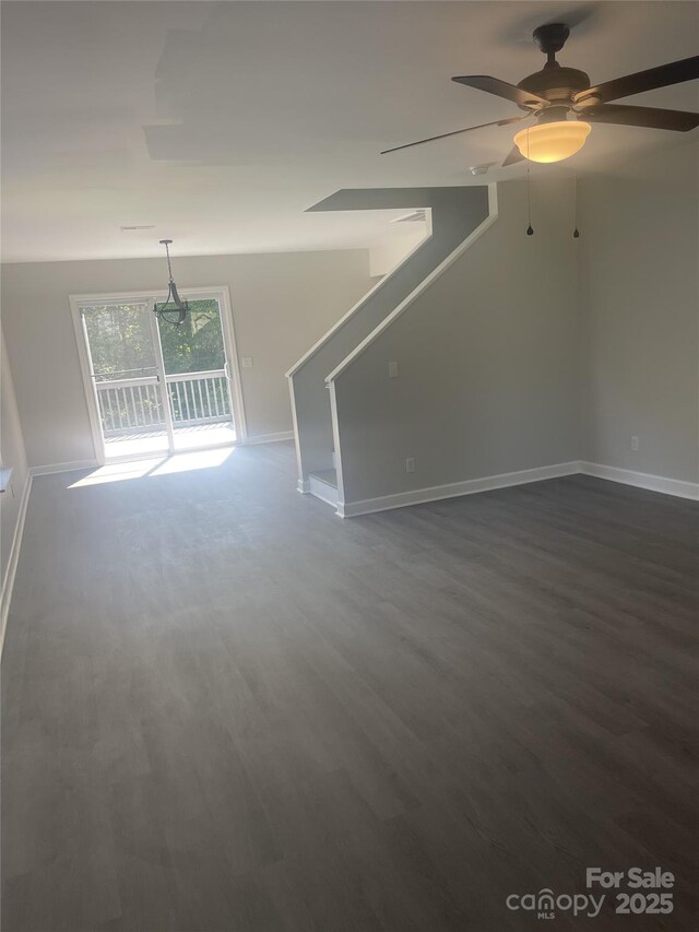 961 Poplar Forest Rdg, Clover, SC 29710 - unfurnished living room featuring dark wood-type flooring and ceiling fan