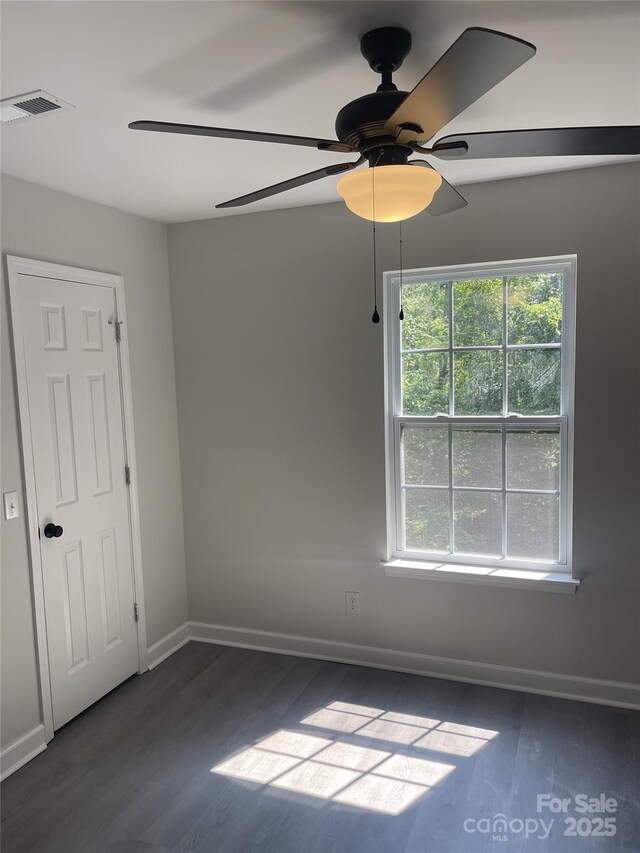 961 Poplar Forest Rdg, Clover, SC 29710 - spare room with dark wood-style flooring, healthy amount of natural light, and a ceiling fan