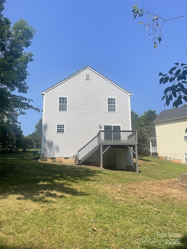 961 Poplar Forest Rdg, Clover, SC 29710 - back of property featuring stairs, a deck, crawl space, and a yard